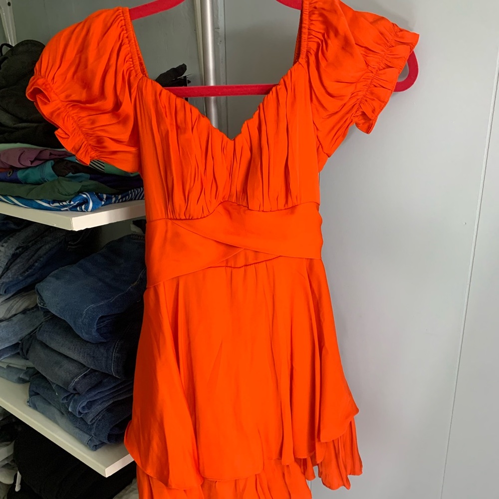 Small orangish red romper